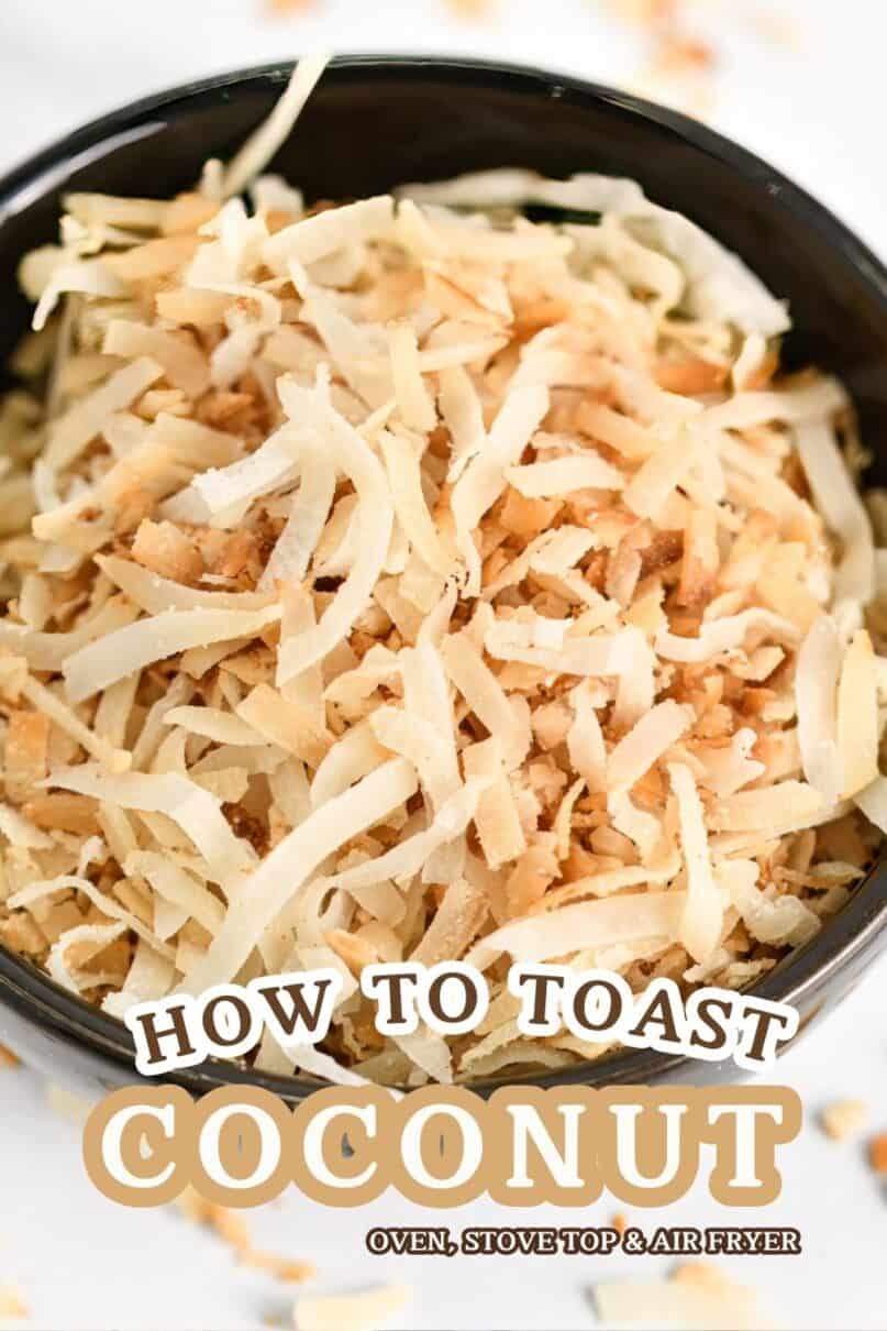 Toasted coconut in a small black bowl on a marble counter with toasted coconut scattered across the surface. with text overlay reading how to toast coconut flakes